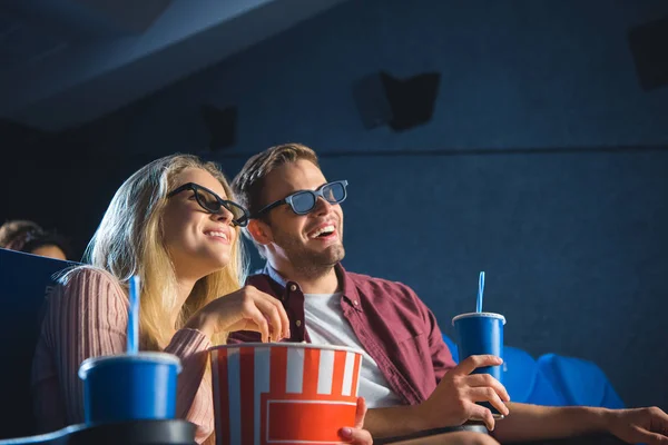 Cheerful Couple Glasses Popcorn Watching Film Together Cinema — стоковое фото